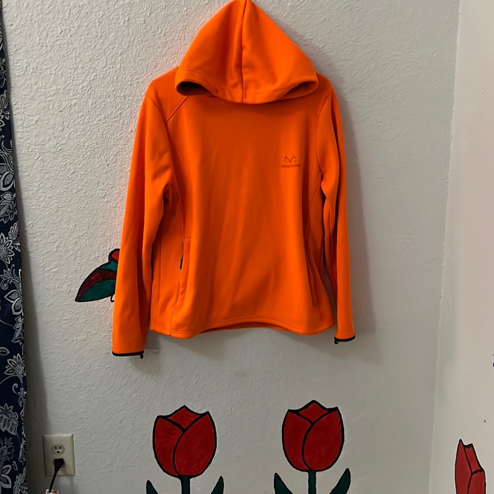Real tree outdoor orange hoodie. Great for hunting.